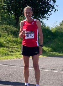 Mike Whyatt winner of the M60 race in 16-39